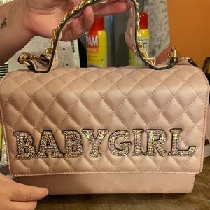 I am selling a diamond purse that says “BABYGIRL” this purse is really beautiful